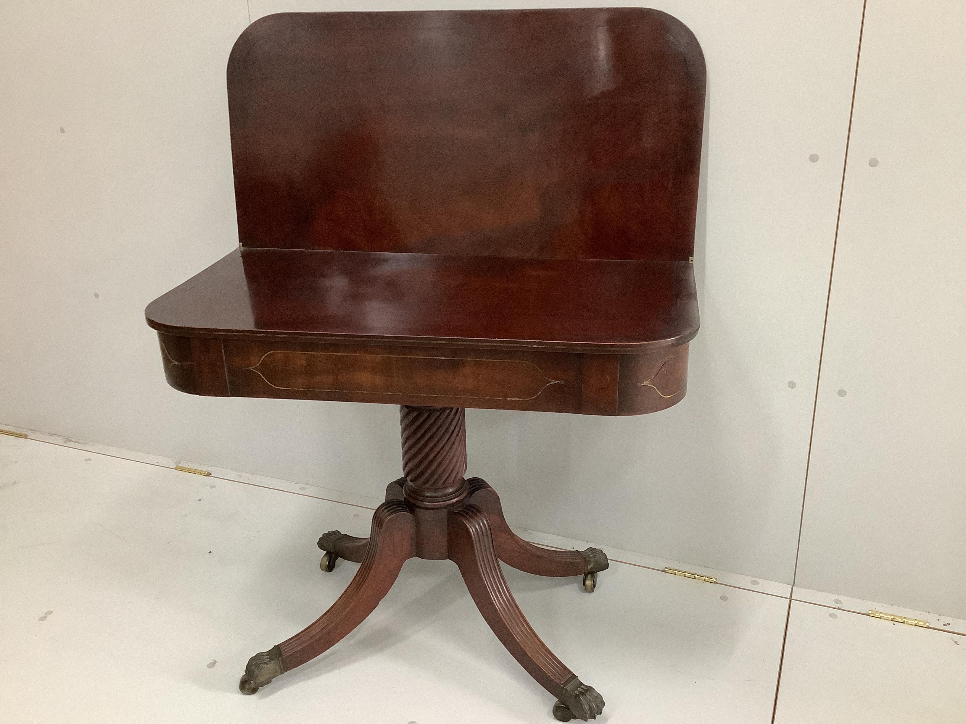 A Regency mahogany folding tea table, width 90cm, depth 45cm, height 74cm